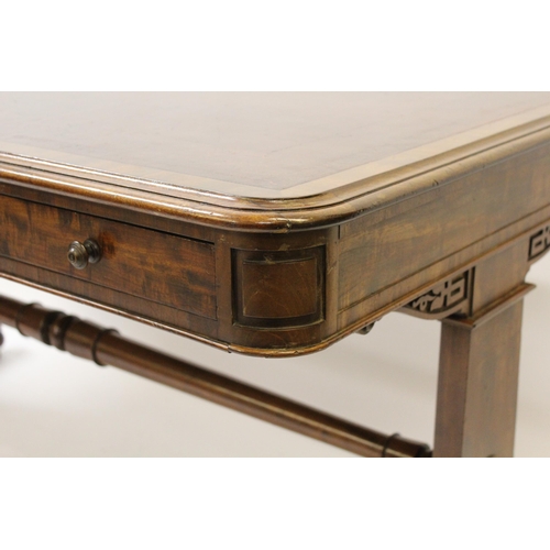 1313 - Good quality William IV mahogany stretcher writing table, the red leather inset moulded top above tw... 