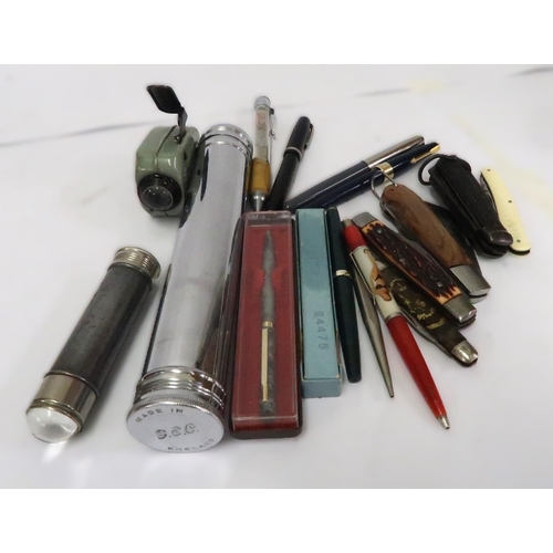 103 - Five various pen knives, three early torches and a small quantity of pens and pencils