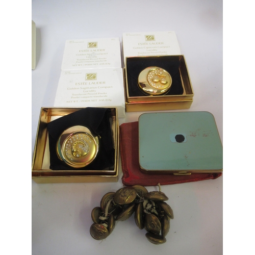 120C - Six various compacts, together with a set of Royal Artillery tunic buttons