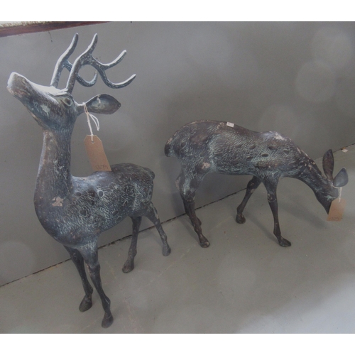 1379 - Pair of small brown patinated metal garden figures of deer, tallest 58cm