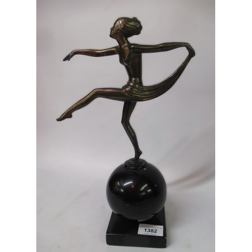 1382 - Coppered patinated metal Art Deco figure of a dancing girl on ebonised marble plinth base, 33cm high