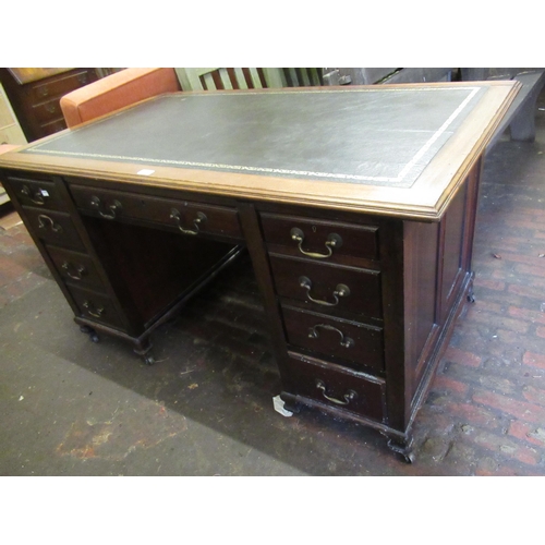 1710A - Early 20th Century mahogany pedestal desk having leather inset top above an arrangement of nine draw... 