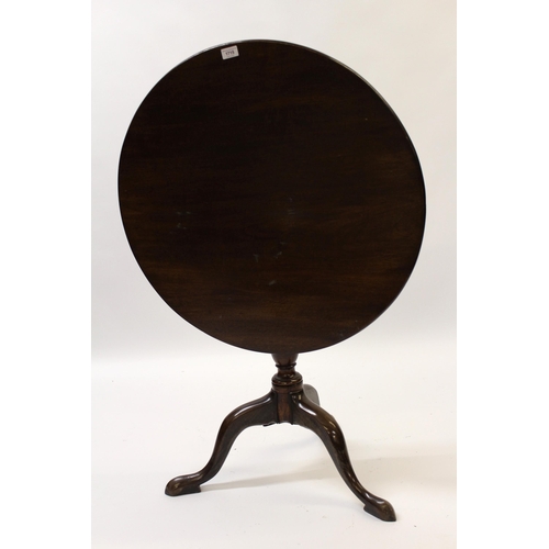 1715 - George III mahogany circular pedestal table, the tilt top above a vase turned column support and tri... 