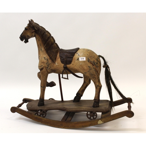 1719 - Small reproduction painted rocking / pull along horse, 84cm long