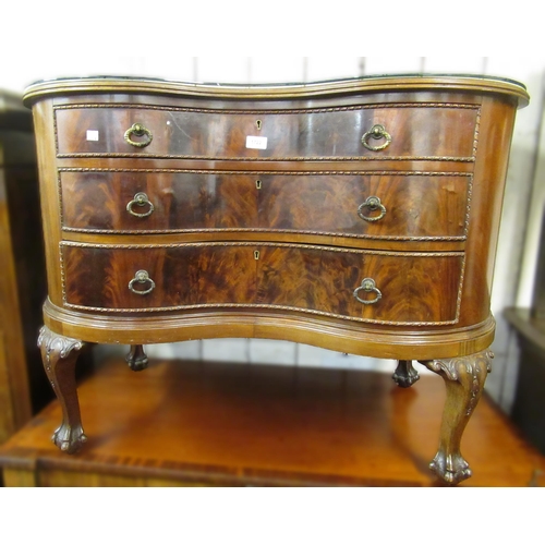 1722 - Early 20th Century mahogany kidney shaped chest, the galleried top above three drawers with brass ha... 