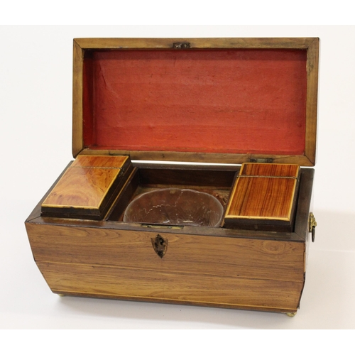 1749 - Regency rosewood sarcophagus shaped tea caddy, the hinged lid enclosing a three division interior wi... 