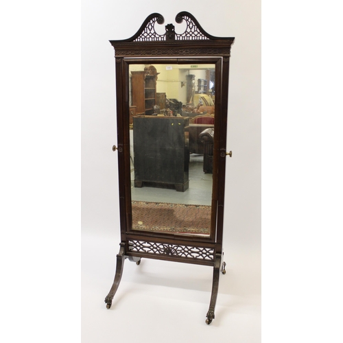 1751 - Good quality carved mahogany cheval mirror in George III style, circa 1900, the pierced swan neck pe... 