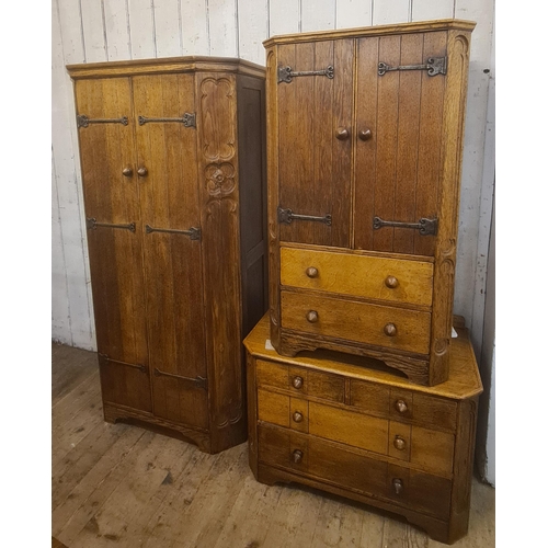 1759 - Arts and Crafts oak bedroom suite comprising:  wardrobe, dressing table and cupboard