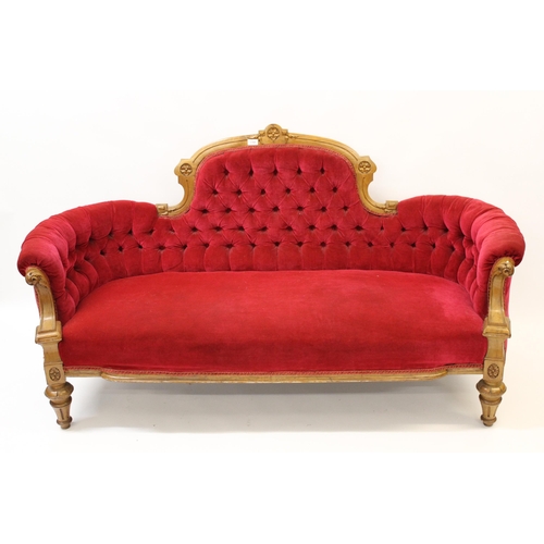 1764 - 19th Century walnut red button upholstered sofa having carved decoration on turned and tapering supp... 