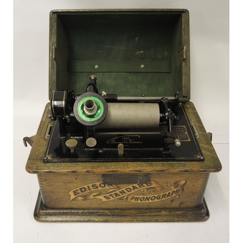 288 - Early Edison standard phonograph in oak case with silvered horn, together with a large quantity of v... 