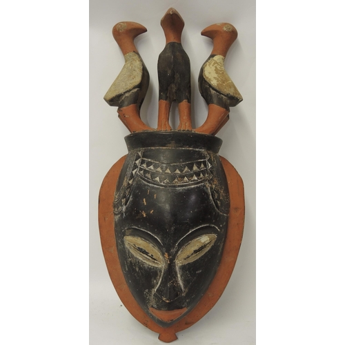 297 - African Ivory Coast carved and painted wooden wall mask, 43cm high