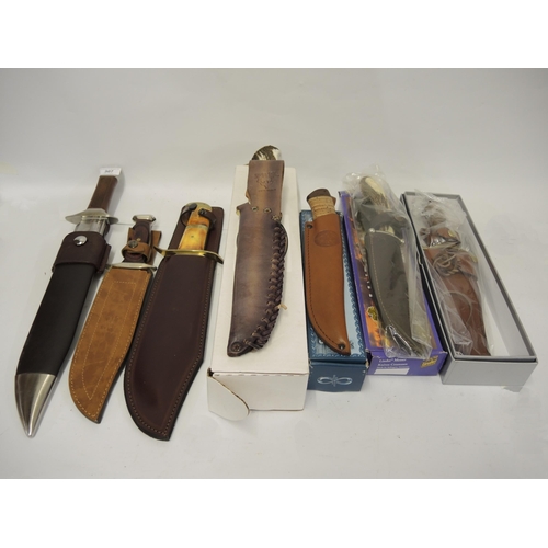 307 - Seven reproduction hunting knives including Carl Linder and Tree Brand, some in original boxes