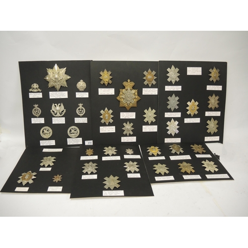 314 - Collection of military cap badges mounted on six cards