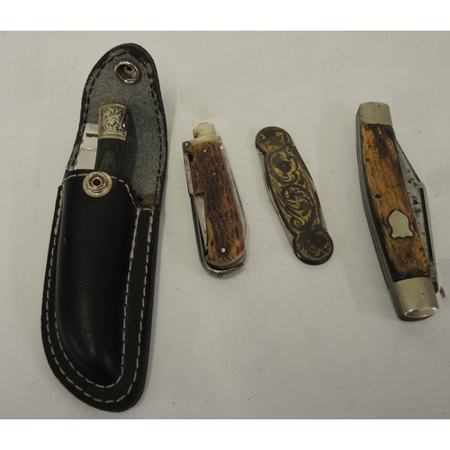 316 - Four various folding knives, including a Laguione with leather case and a Premium Stock knife