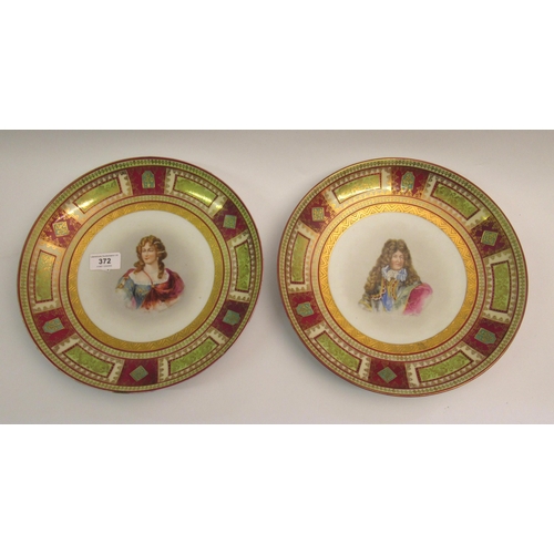 372 - Pair of late 19th / early 20th Century Vienna plates painted with portraits of Louis XIV and Duchess... 