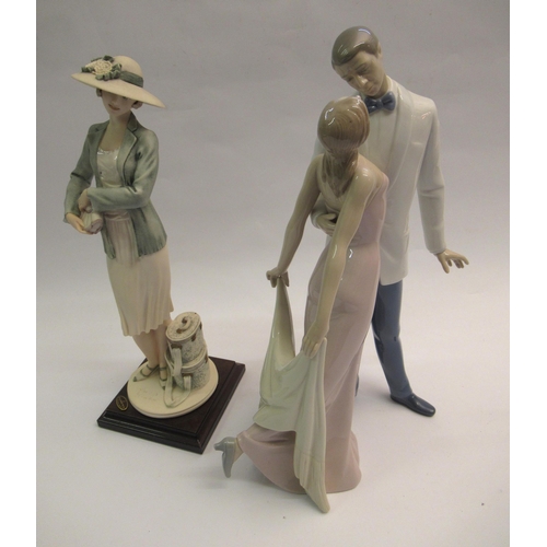 376 - Lladro group of a man and woman in original box, together with a Florence Giuseppe Armani figure in ... 