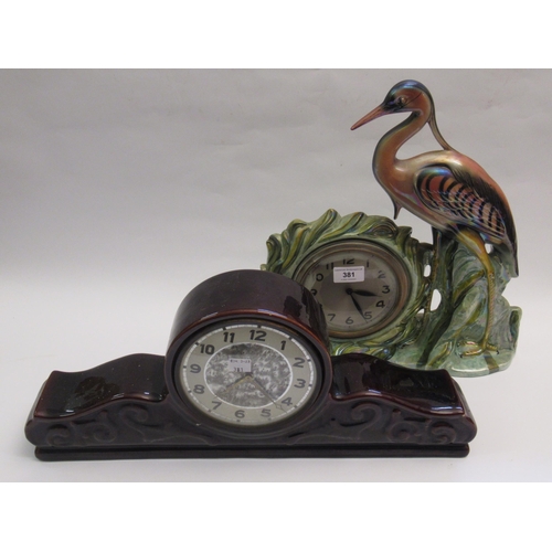 381 - Unusual porcelain mantel clock in the form of a heron with lustre finish, together with another porc... 