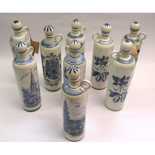 389 - Group of nine 20th Century Dutch blue and white pottery decanters