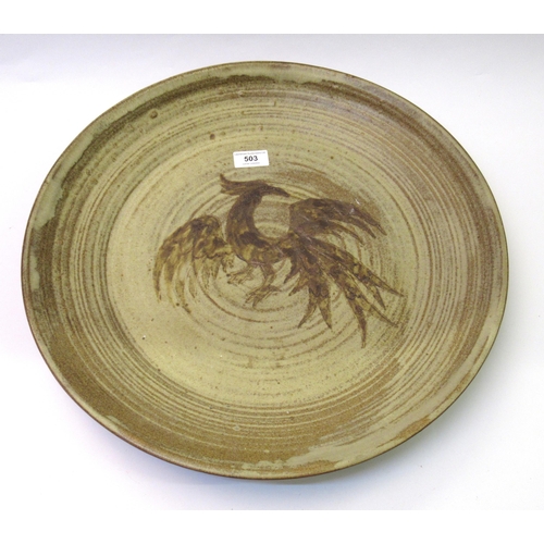 Large 20th Century circular stoneware wall plate, decorated with an exotic bird, 46cm diameter