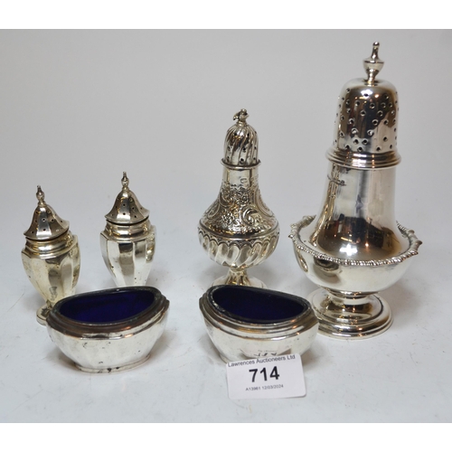 714 - Sheffield silver circular baluster form sugar caster, similar pepper and four silver condiments