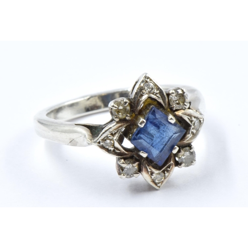 744 - Dress ring set square sapphire and diamonds in a white metal mount