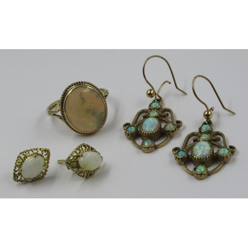 749 - 9ct Gold oval opal set ring, together with a pair of opal set eardrops and another pair of opal set ... 