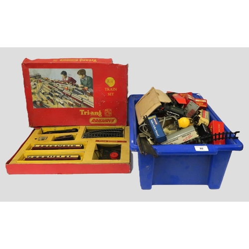 80 - Triang boxed 00 gauge railway engine set, together with a quantity of various carriages and accessor... 