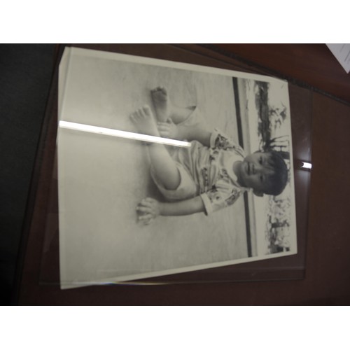 175 - Quantity of 1950's large format photographs, views of Singapore and child portraits