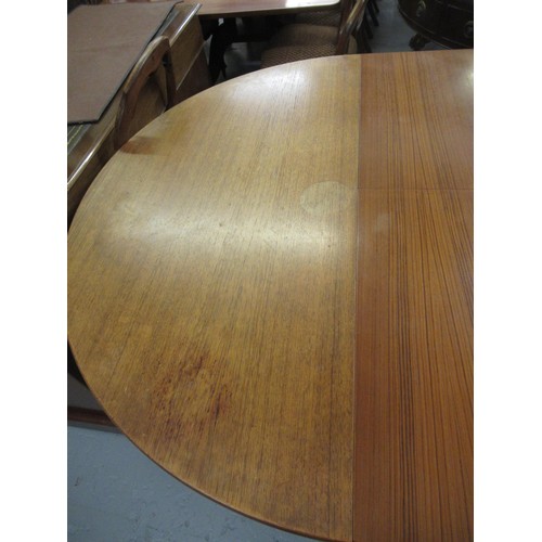 1773 - Small mid 20th Century Danish circular teak dining table with integral leaf, with four chairs each w... 