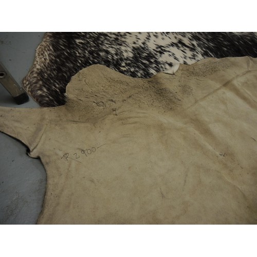 188 - Mottled black, brown and white full cowhide rug