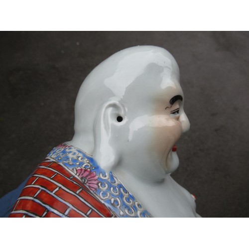 397 - Chinese porcelain figure of seated Buddha, signed with seal mark to base, 26cm high