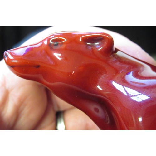 513 - Royal Doulton Flambe figure of a seated bear, 8.5cm high