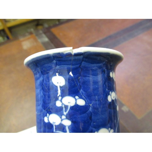 388 - Pair of Chinese blue and white prunus blossom decorated cylindrical flared rim vases, 25cm high toge... 