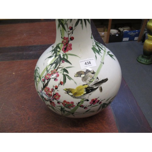 438 - Modern oriental baluster form vase decorated with flowers, birds and panels of script, 41cm high