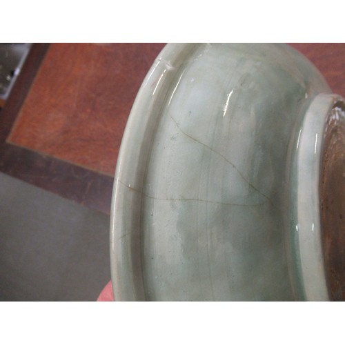 369 - Chinese Celadon circular deep dish with shallow incised decoration, 32cm diameter, with a hardwood s... 