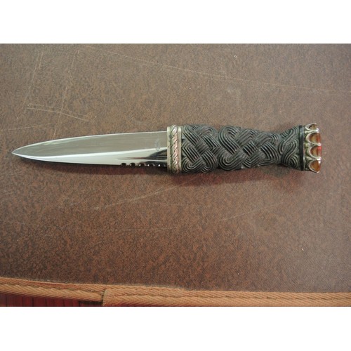 322 - Scottish dirk with stainless steel blade, silver mounted sheath and stone inset finial, together wit... 