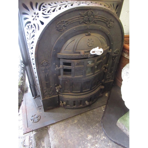 1397 - Jan Jaarsma, late 19th Century cast iron stove with relief moulded cast decoration, including base -... 