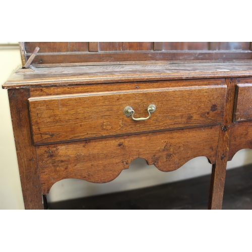 1404 - Small 19th Century oak plank top dresser with shelved back, having two short drawers with undertier,... 