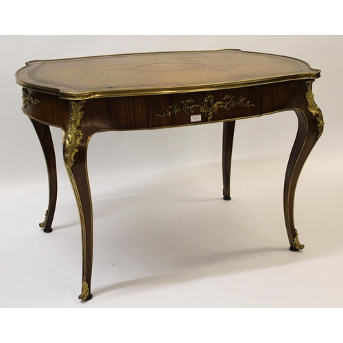 French walnut writing table having brown leather gilt tooled inset top with single frieze drawer on cabriole supports, having gilt metal mounts, 73cm high x 114cm wide x 75cm deep