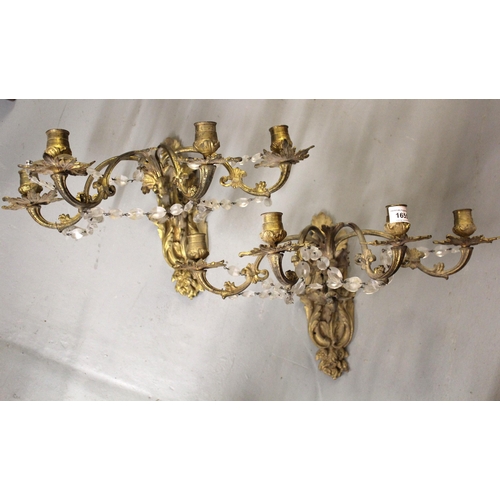 1655 - Pair of 19th Century French ormolu and crystal four branch wall lights, 29cm high