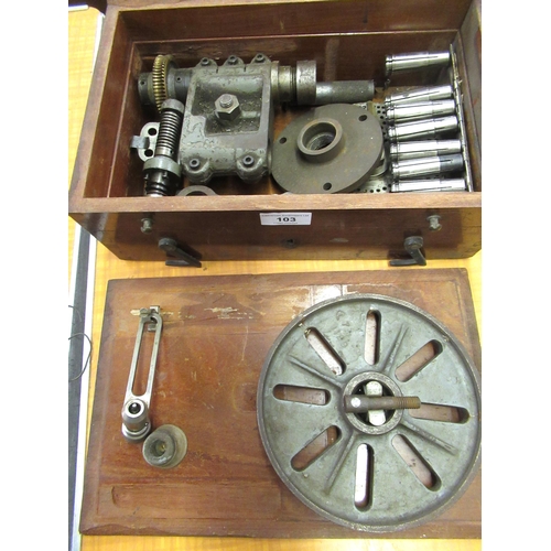 103 - 19th / early 20th Century iron and steel lathe type machine, housed in a mahogany case