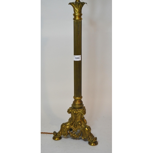 1088 - Brass column form lamp base on decorative gilt brass triform base, 66cm high