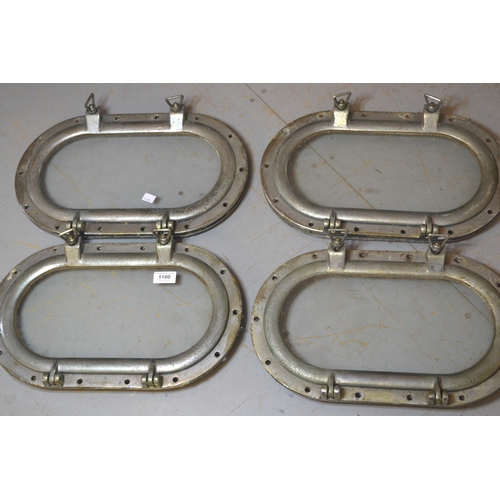 1100 - Set of four silvered metal oval porthole covers, each approximately 44 x 27cm