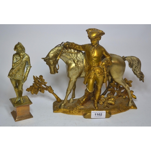 19th Century clock garniture in the form of a rider and horse, together with a brass figure
