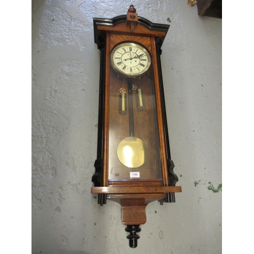 1106 - Late 19th Century Continental walnut and part ebonised Vienna style wall clock, the architectural ca... 