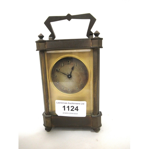 1124 - Early 20th Century gilt brass carriage clock, the silvered dial with Arabic numerals, with a single ... 