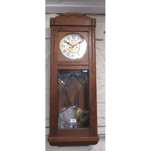 1130 - 1930's Oak cased wall clock in Vienna style, the circular silvered and gilt dial with Arabic numeral... 