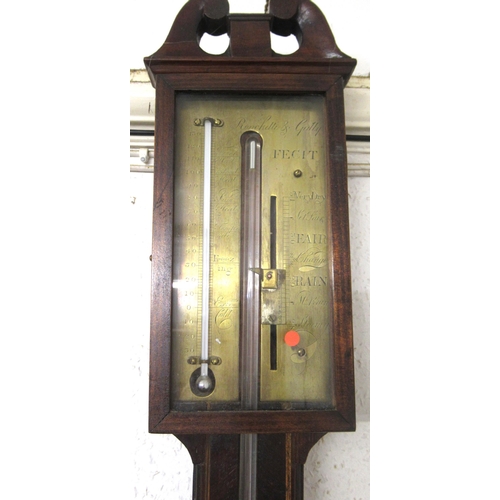 1132 - George III mahogany and line inlaid stick barometer with a brass dial and exposed mercury tube, the ... 