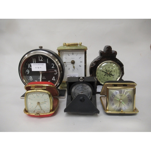 1137 - Gilt brass and onyx mantel clock, together with a quantity of travel clocks etc.