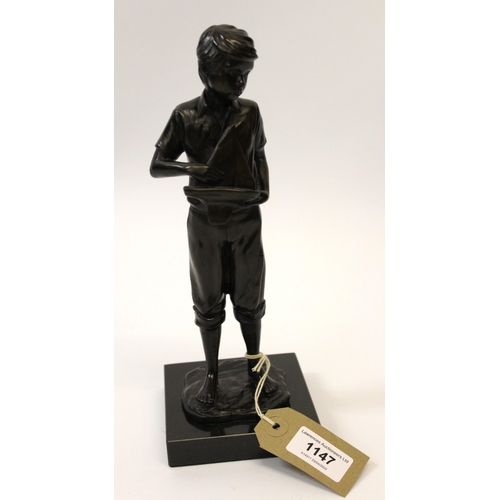 1147 - Sherree Valentine Daines, dark patinated bronze figure of a boy holding a pond yacht, No. 53 of 195,... 